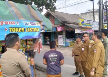Kecamatan Banjar Agung bersama Tim DLHD Kabupaten Tulangbawang melakukan sosialisasi terkait penebangan pohon di unit Dua